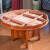 静かな朴純木の円形の食卓の椅子の組合せは回転盤の中国式の古彫刻の食事台のホテルの家庭用の大きい円卓を持って鋼化のガラスの単テーブルを溶かします+6つの象の首の椅子の1.2メートル