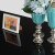 モダン家庭の食卓港式軽い贅沢なステンレスのテーブルとテーブルのセット小さいタイプレストランの家具黒の漆焼きガラス（セット）一テーブル六椅子（標準サイズ）