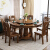 顧楽の家の食卓の純木の食卓の円形の食卓の椅子は中国式の大きい円いテーブルを組み合わせて回転テーブルのホテルのホテルの家庭用の夕テーブルの胡桃色の1.5 mのシングルテーブルを持ちます。