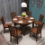 Batesonテーブル純木のテーブルとテーブルの組み合わせが伸縮した形のテーブルAタイプ1.38メートル胡桃色のテーブル4つの椅子です。