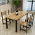 二番のテーブルとテーブルセットのシンプロテーブル長方形家庭用テーブルレストランのテーブル4人/6人の白い面に黒い棚120*70テーブルに椅子4つを配置します。