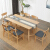 北欧純木食のテーブルと椅子の組み合わせ4つの椅子と6つのレストランのホワイトワックスの家具を組み立てる1.4メートルのテーブルと4つの椅子