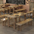 食堂のテーブルと椅子の組み合わせ学校の従業員のレストランの純木の軽食の店のラーメン屋の大きい屋台のファーストフードのテーブルと椅子の長方形の4人の経済型の明るい色の炭素化の60*60高い75の1テーブルの2つの短い腰掛け