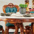ロイヤルルイズ洋風烏金木の食卓が軽い純木家庭用大理石回転盤丸食テーブルセットアメリカ式別荘家具1.3 m烏金木にマーブル（テーブル）を配合しています。