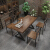 鉄芸純木テーブル長方形のバーバーでバーベキューをしましょう。音楽レストラン喫茶の工業風テーブルと椅子の組み合わせは05台の四つの椅子（テーブルの長さは1.2メートル、厚さは5センチ）です。
