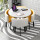 テーブルの4つの椅子+イエローホワイト(革の椅子)は大理石の円卓をまねる。