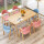鉄芸原木色のテーブルに6つの鉄芸Aの字の椅子を配合します。